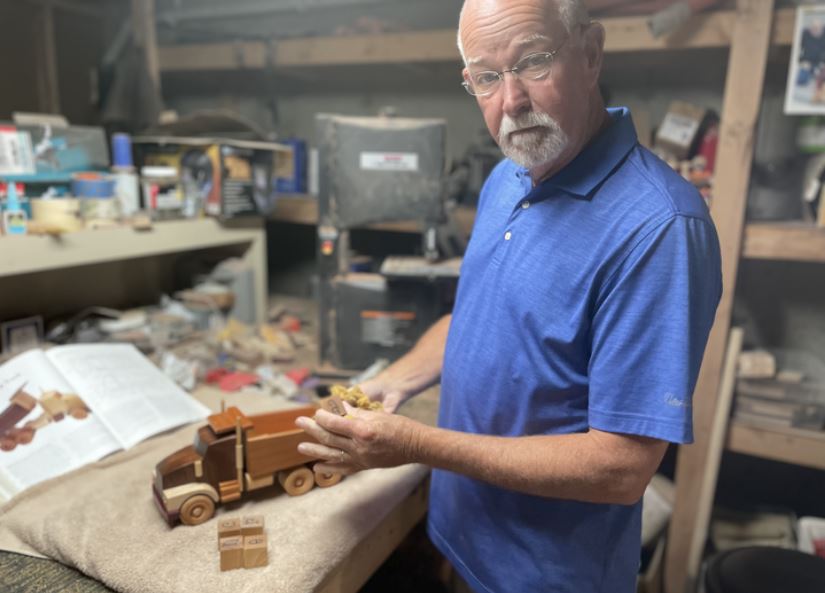 Cancer survivor inspires others by crafting wooden trucks that 'dump' the disease - Vimarsana News