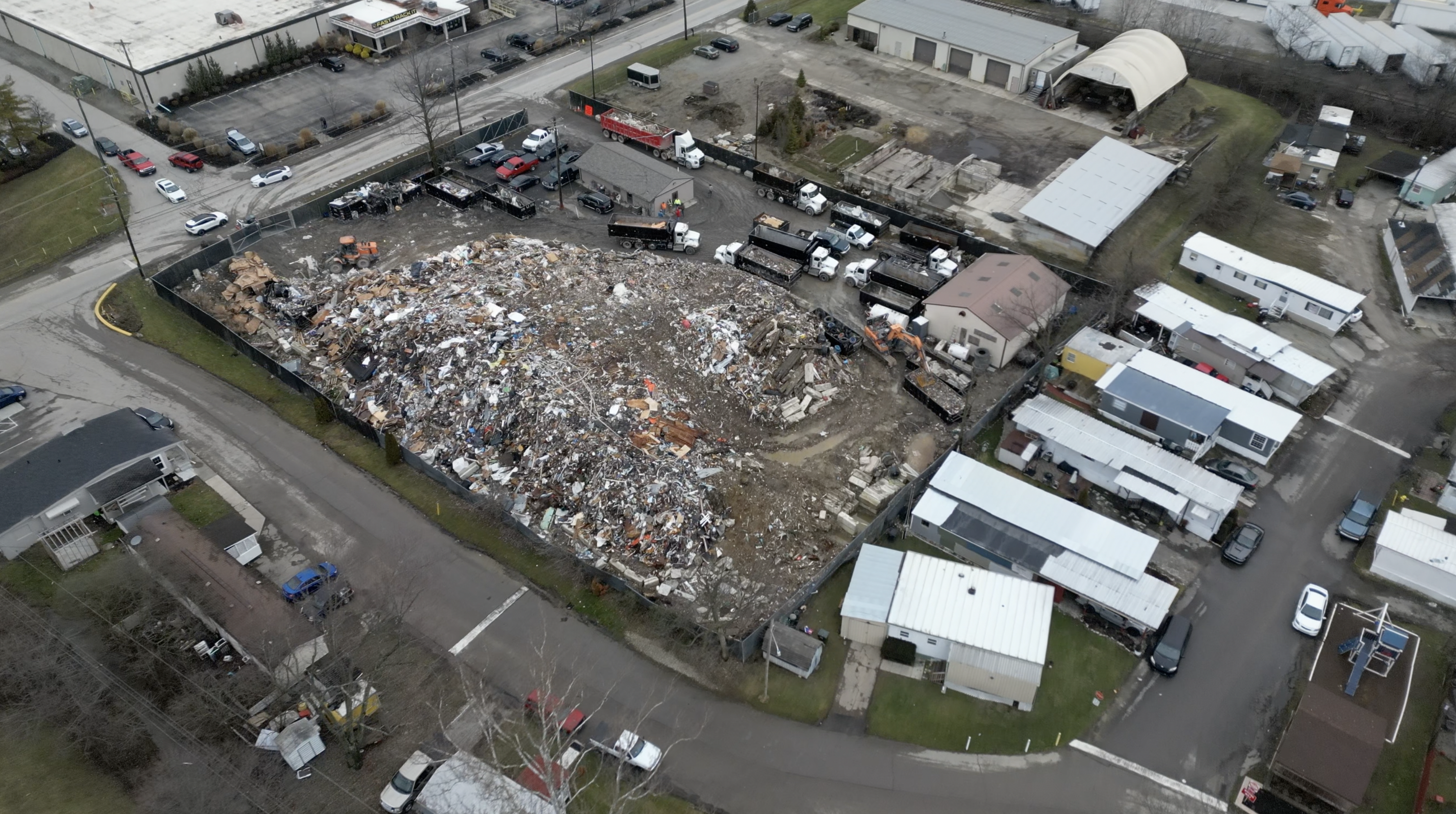 Residents try to find solutions for issues with large debris pile next to homes - Vimarsana News
