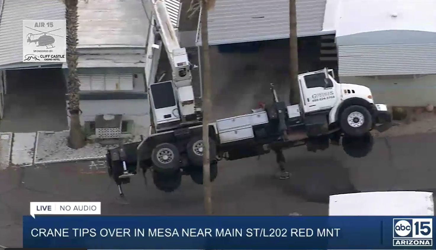Crane tips over on top of a Mesa mobile home, causes brief power outage - Vimarsana News