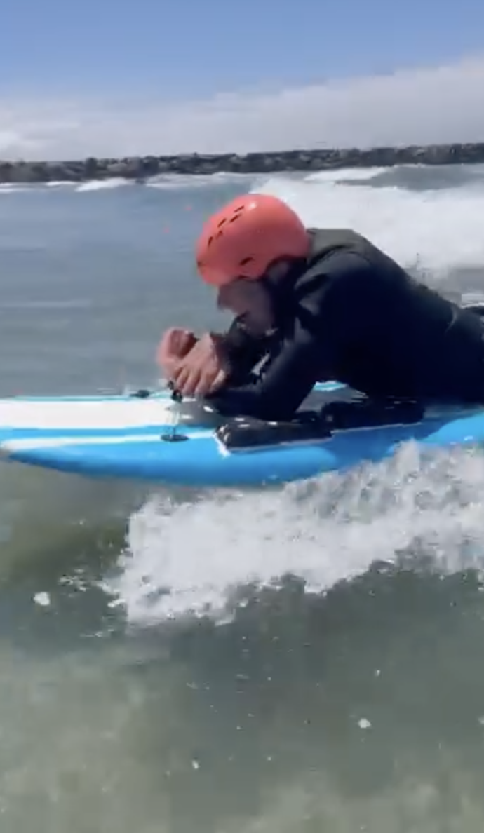 Paralyzed San Diego State graduate surfs again - Vimarsana News