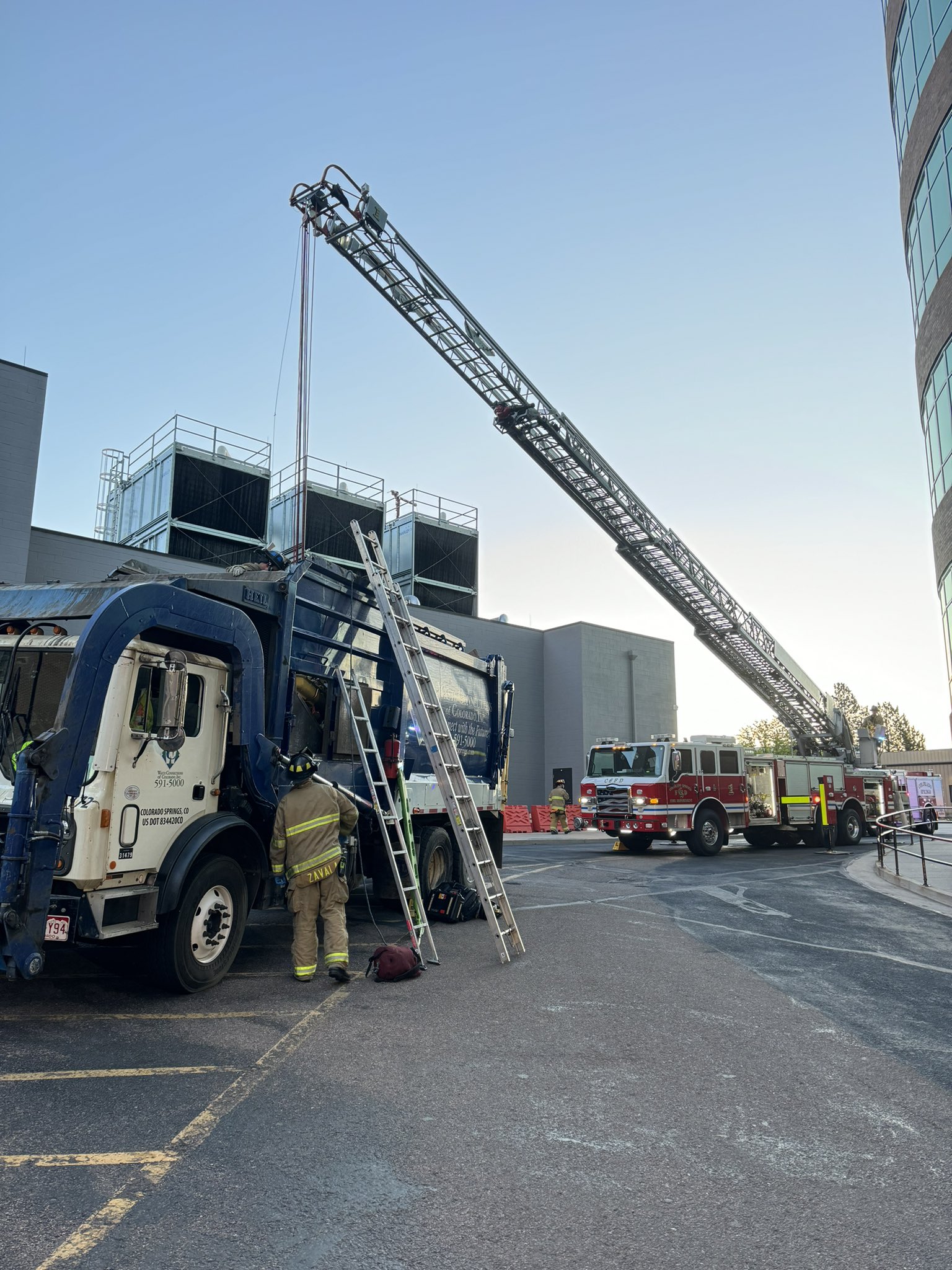 Colorado Springs Fire Department works to save a man trapped in a garbage truck - Vimarsana News